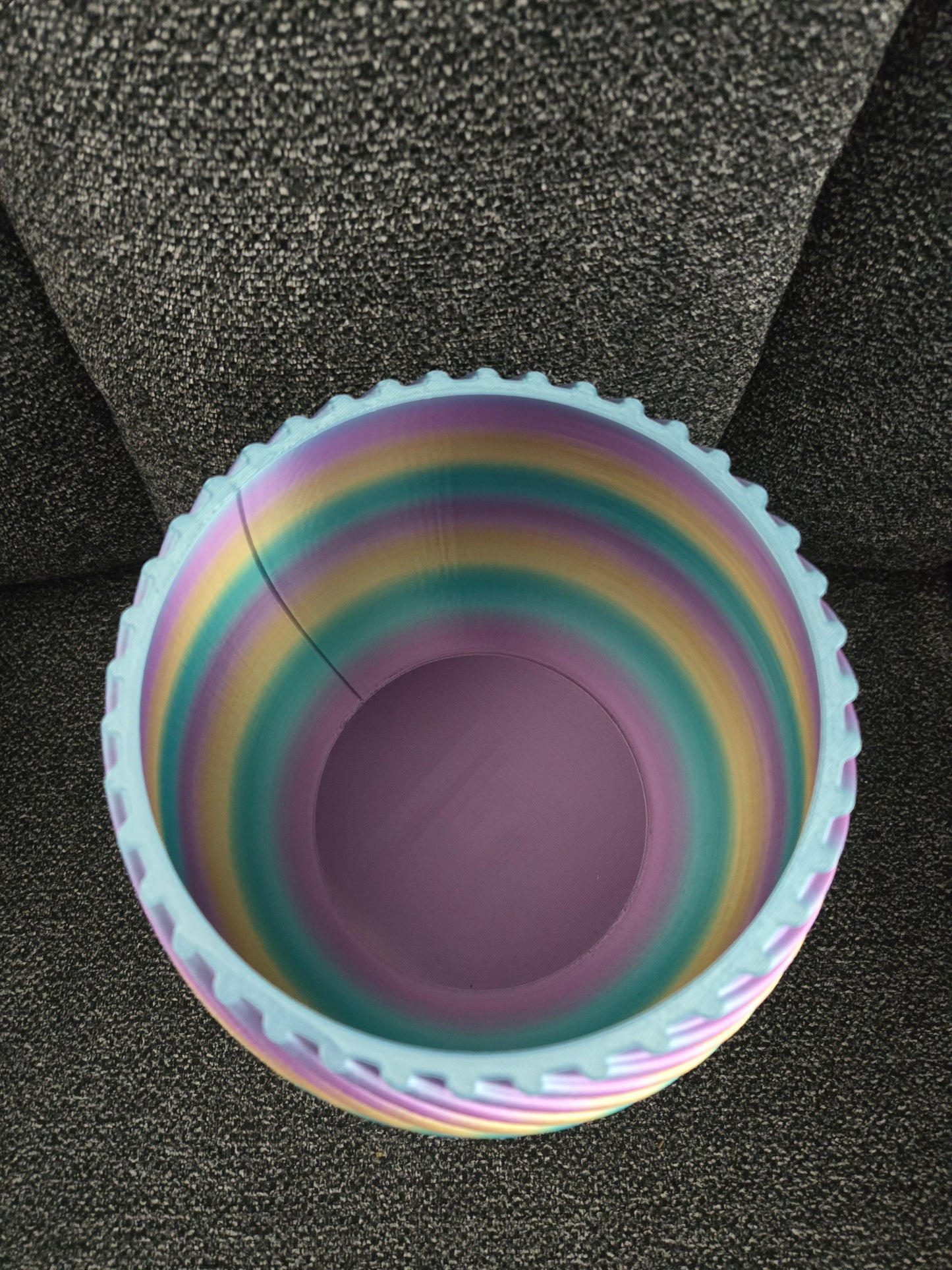 3D printed spiral flower pot top-down view showing interior and scalloped rim detail