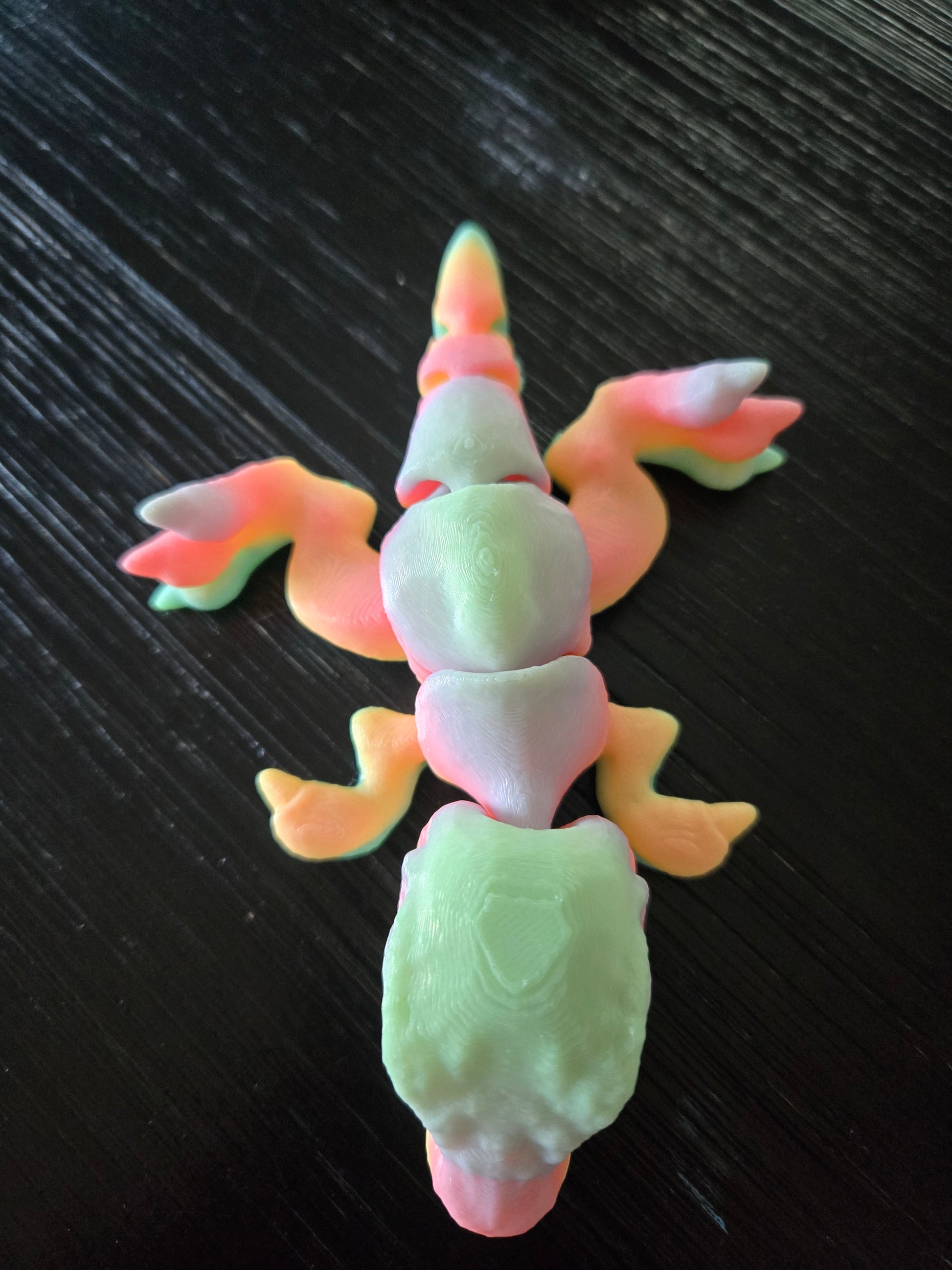 Tinny T-Rex 3D printed dinosaur figurine side view, colors may vary, made by Z Axis Rising