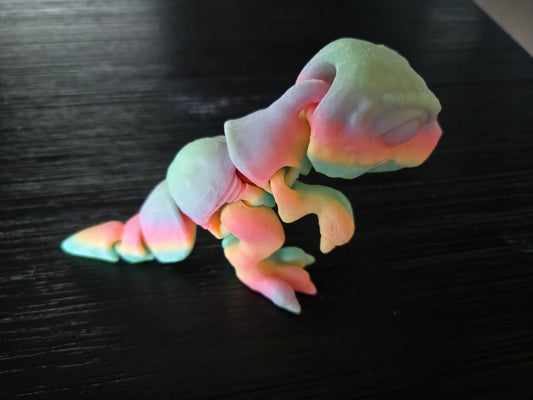 Tinny T-Rex 3D printed dinosaur figurine front view, colors may vary, made by Z Axis Rising