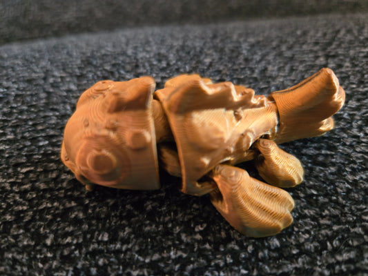 Mini Koi Companions 3D printed articulated figurine – close-up of golden articulated koi fish showing detailed scales and movable segments
