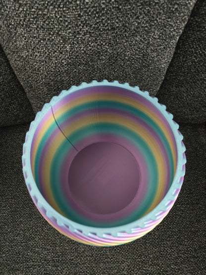3D printed spiral flower pot top-down view showing interior and scalloped rim detail
