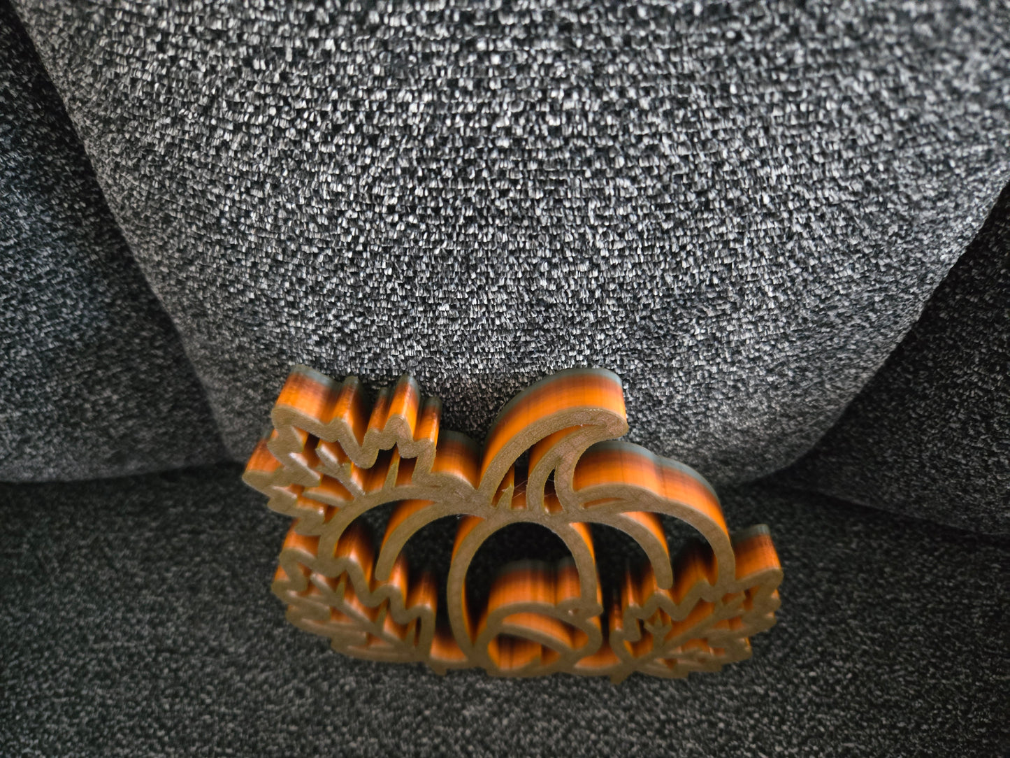 Close-up front view of 3D printed Pumpkin Harvest Scene showing multicolor blended orange and gold filament detail