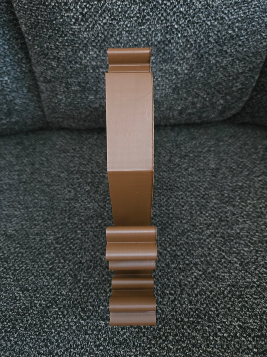 Side profile view of 3D printed Home Sweet Harvest House showing thickness of the open-frame silhouette in warm brown filament