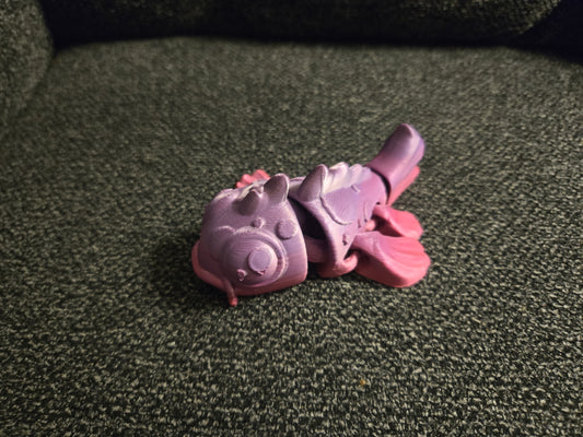 3D printed articulated mini koi fish with chubby face and poseable tail, colors may vary